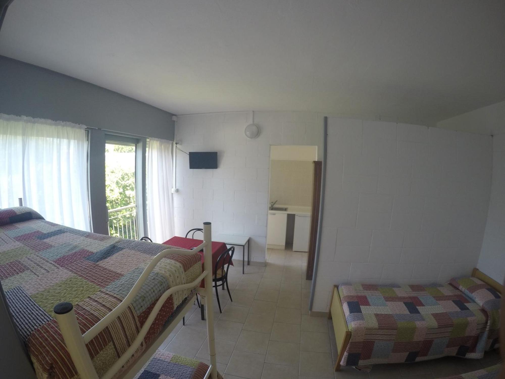 Camping Villaggio Paradiso Домазо Номер фото
